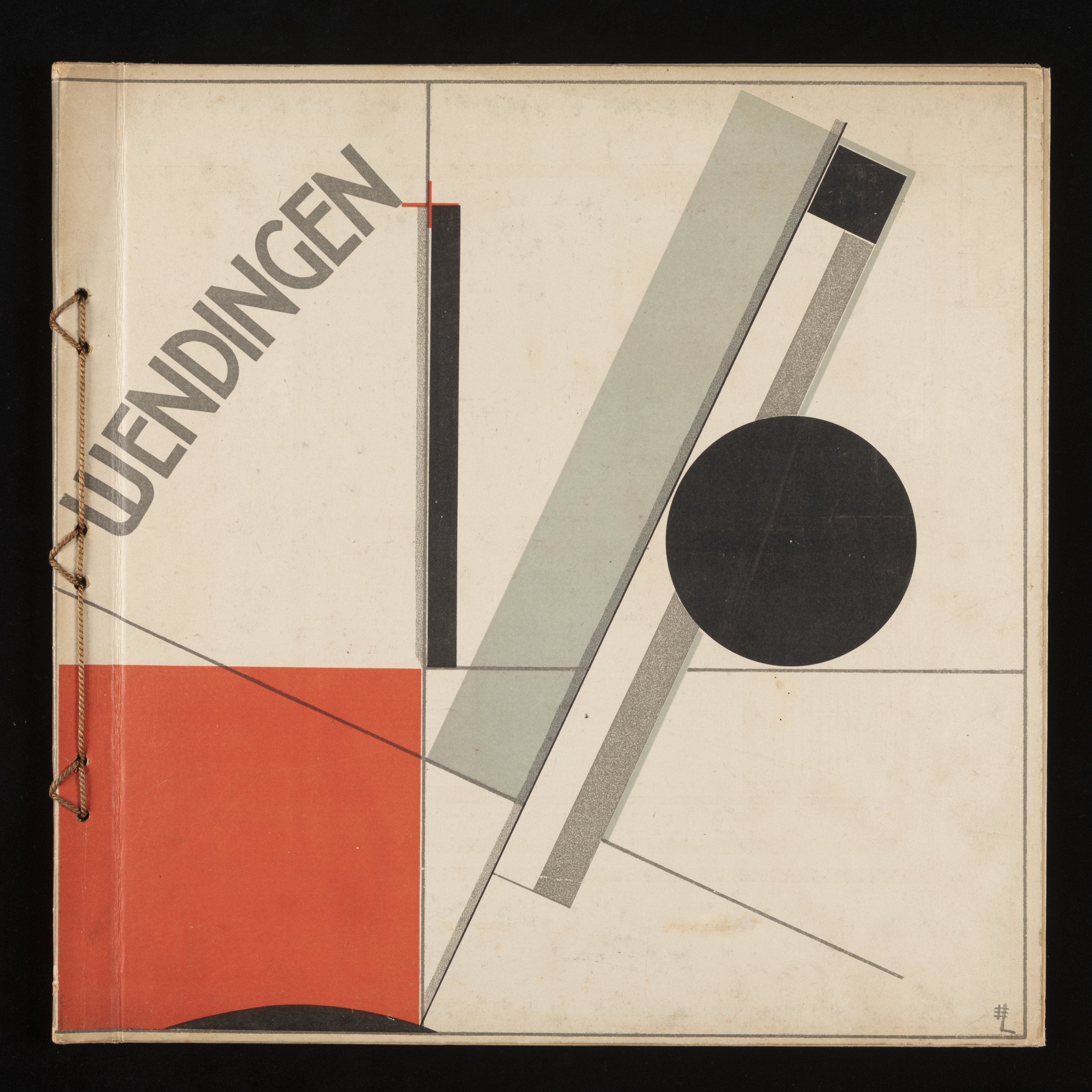 Square-format magazine cover in white printed with geometrical shapes and lines in black, red and grey. Top left section features the word WENDINGEN in grey positioned diagonally.